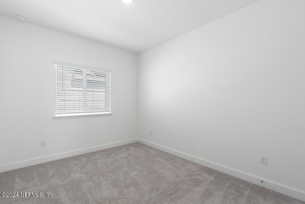 116 Alston Dr Street St. Augustine, FL 32092 - Photo 34 of 58 an empty room with a window