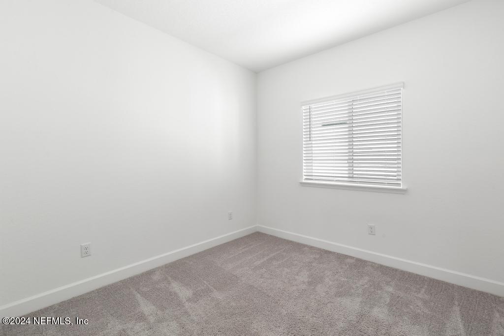 116 Alston Dr Street St. Augustine, FL 32092 - Photo 38 of 58 an empty room with a window