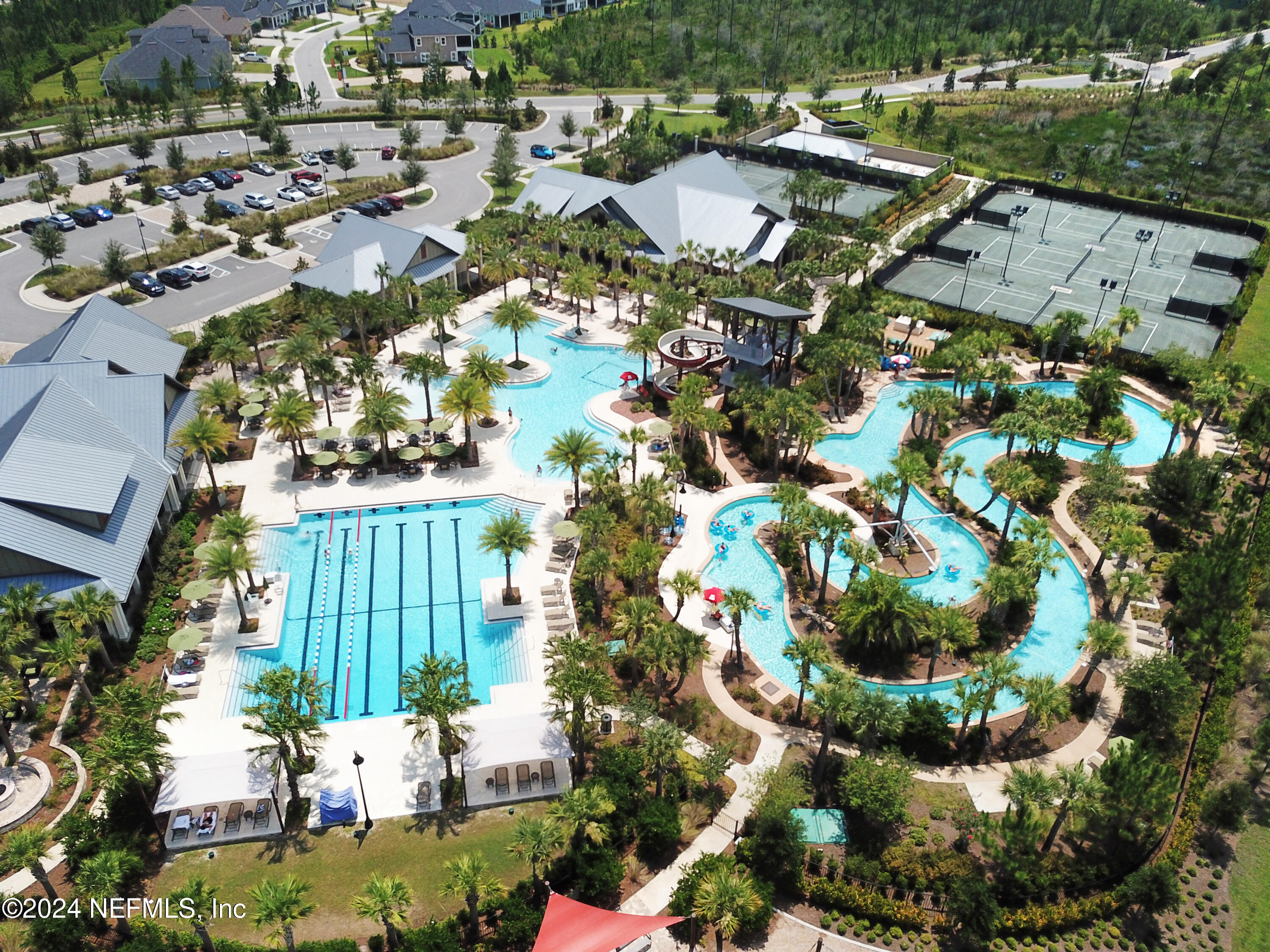116 Alston Dr Street St. Augustine, FL 32092 - Photo 45 of 58 an aerial view of a house with a yard and lake view