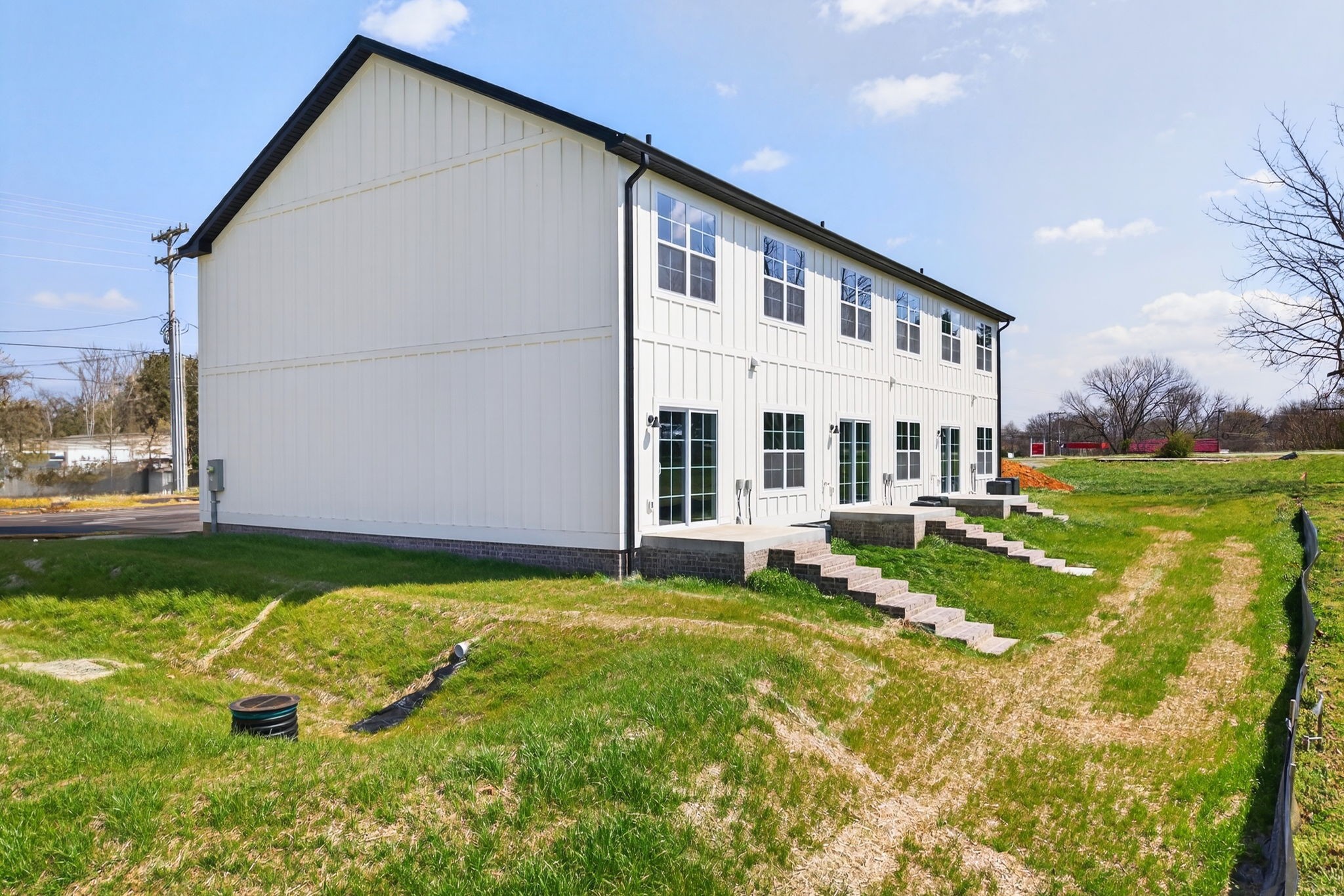 214 West Jere Whitson Road Cookeville, TN 38501 - Photo 3 of 31 a view of a house with backyard and sitting area