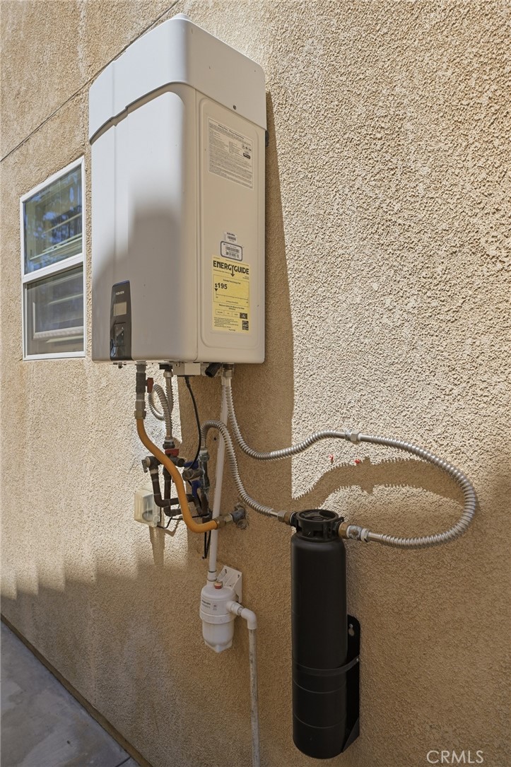 13903 Highlander Road La Mirada, CA 90638 - Photo 52 of 65 Newer tankless water heater