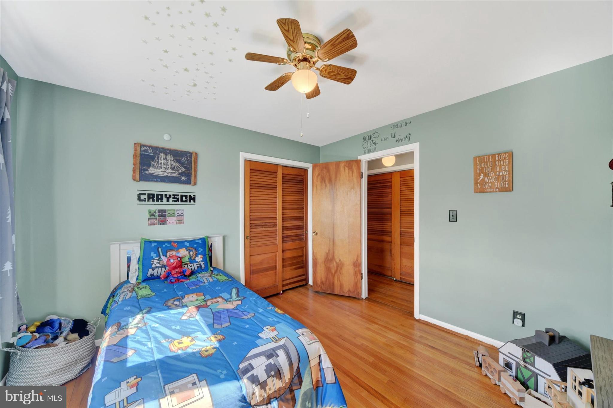 1504 Groveton Court Fallston, MD 21047 - Photo 13 of 29 a bedroom with a bed and wooden floor