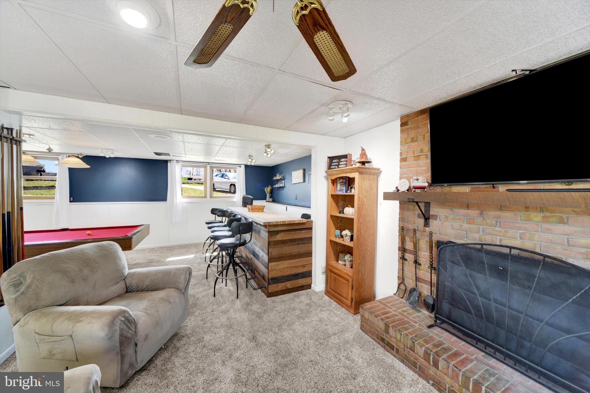 1504 Groveton Court Fallston, MD 21047 - Photo 21 of 29 a living room with furniture and a flat screen tv