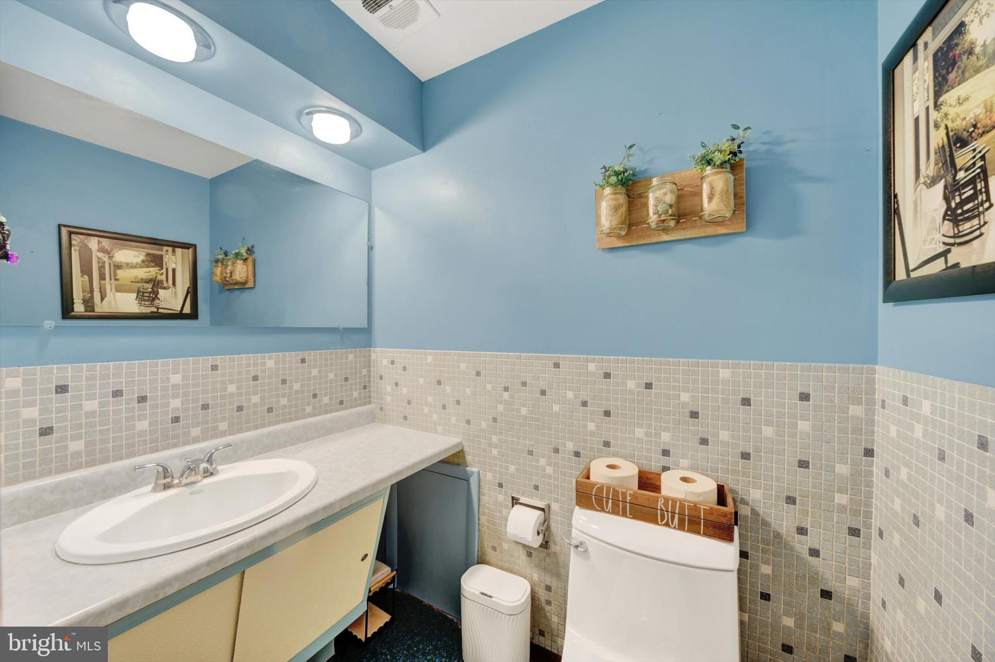 1504 Groveton Court Fallston, MD 21047 - Photo 23 of 29 a bathroom with a sink toilet and mirror