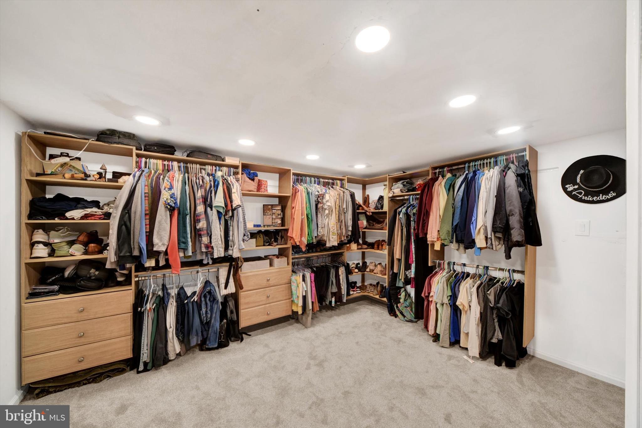 1504 Groveton Court Fallston, MD 21047 - Photo 26 of 29 a view of walk in closet with clothes and shoes