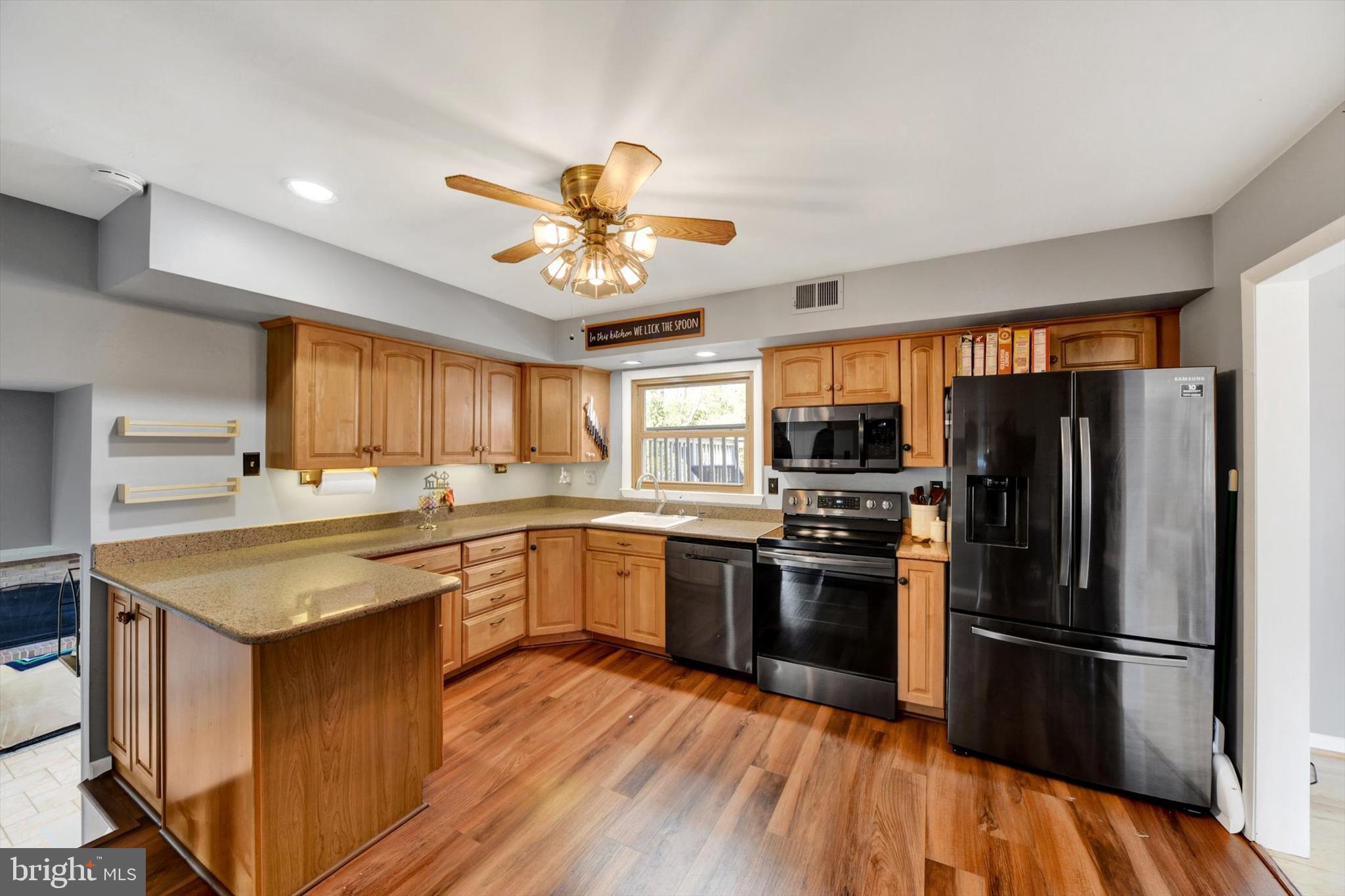 1504 Groveton Court Fallston, MD 21047 - Photo 8 of 29 a kitchen with stainless steel appliances granite countertop a stove refrigerator sink and dishwasher