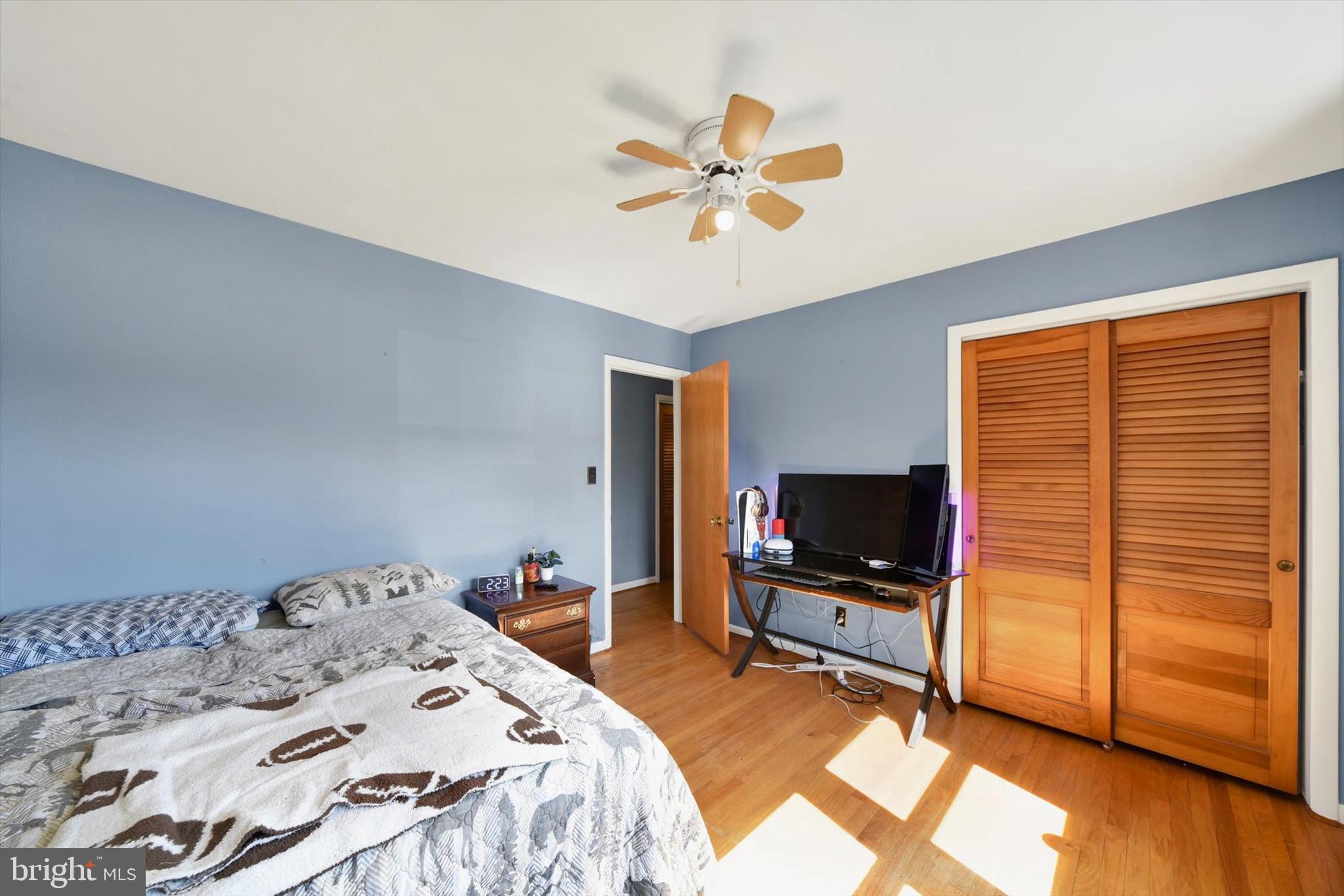1504 Groveton Court Fallston, MD 21047 - Photo 10 of 29 a bedroom with a bed and wooden floor
