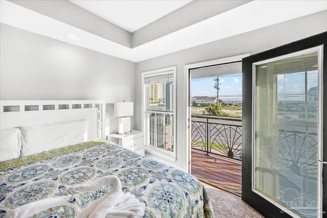 a bathroom with a double vanity sink toilet mirror and shower