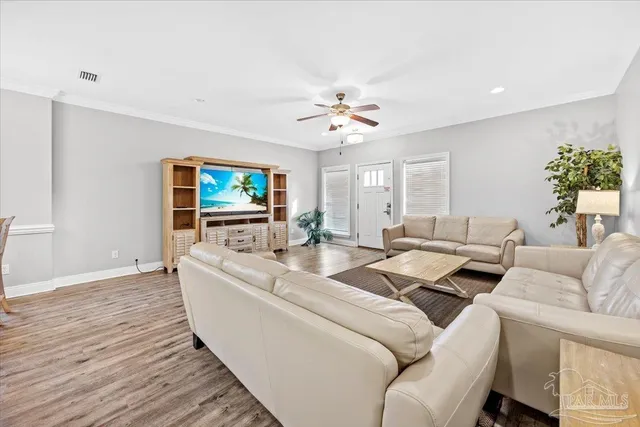 a spacious bathroom with a double vanity sink and mirror with shower