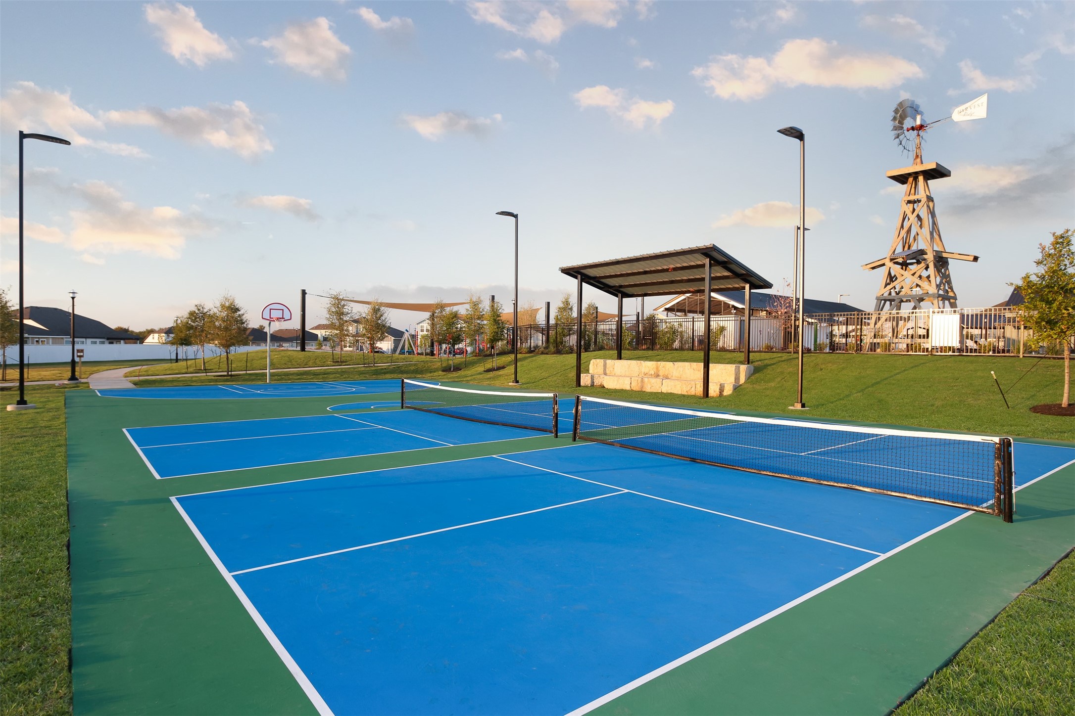 117 Huckleberry Lane Elgin, TX 78621 - Photo 26 of 34 Pickleball and basketball courts