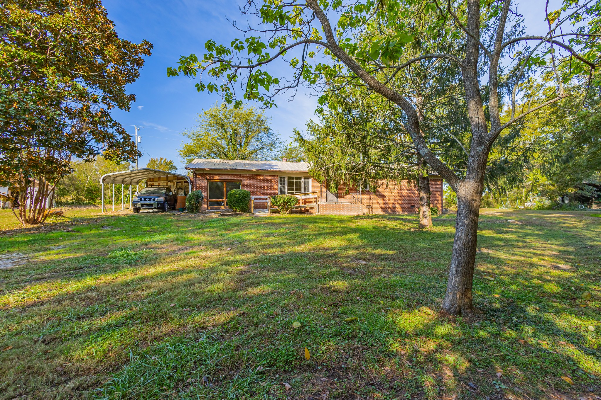 340 Yates Road Hillsboro, TN 37342 - Photo 2 of 69 a view of a house with a big yard