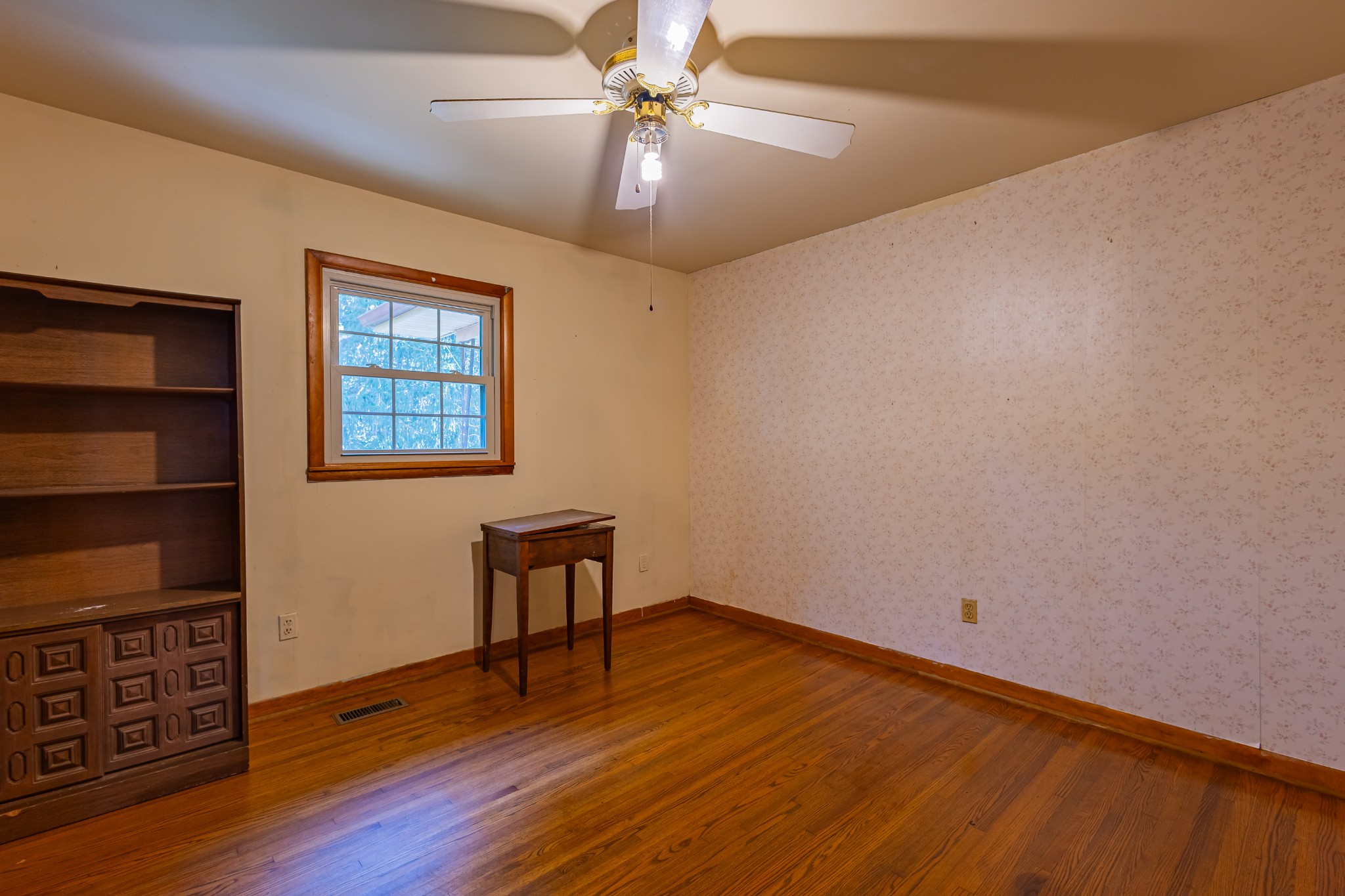 340 Yates Road Hillsboro, TN 37342 - Photo 27 of 69 a view of an empty room with a window and wooden floor