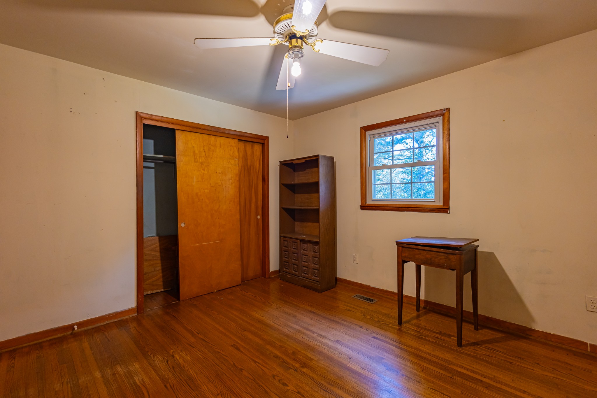 340 Yates Road Hillsboro, TN 37342 - Photo 28 of 69 a view of an empty room with a window and wooden floor