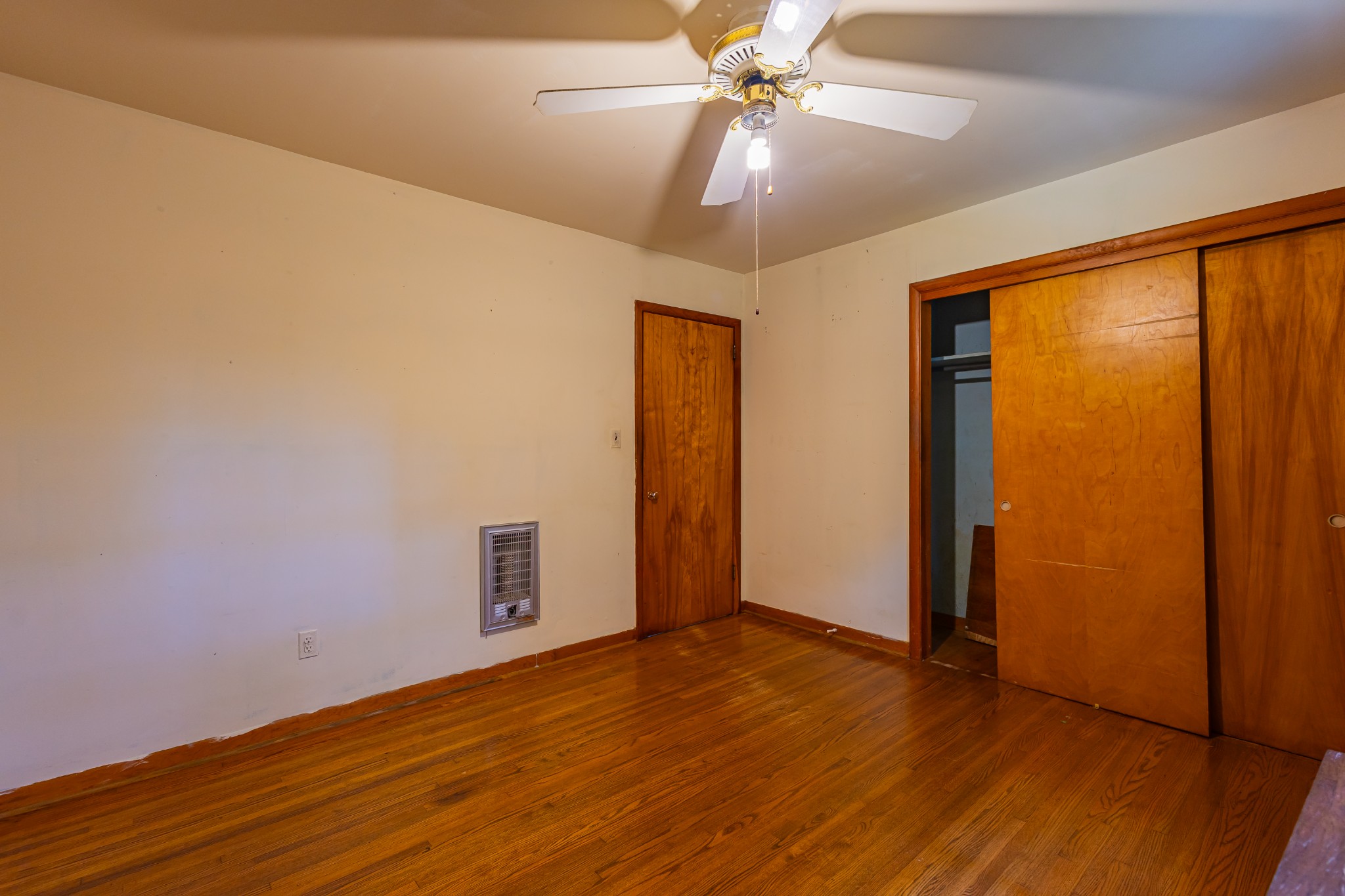 340 Yates Road Hillsboro, TN 37342 - Photo 29 of 69 a view of an empty room with wooden floor and a window