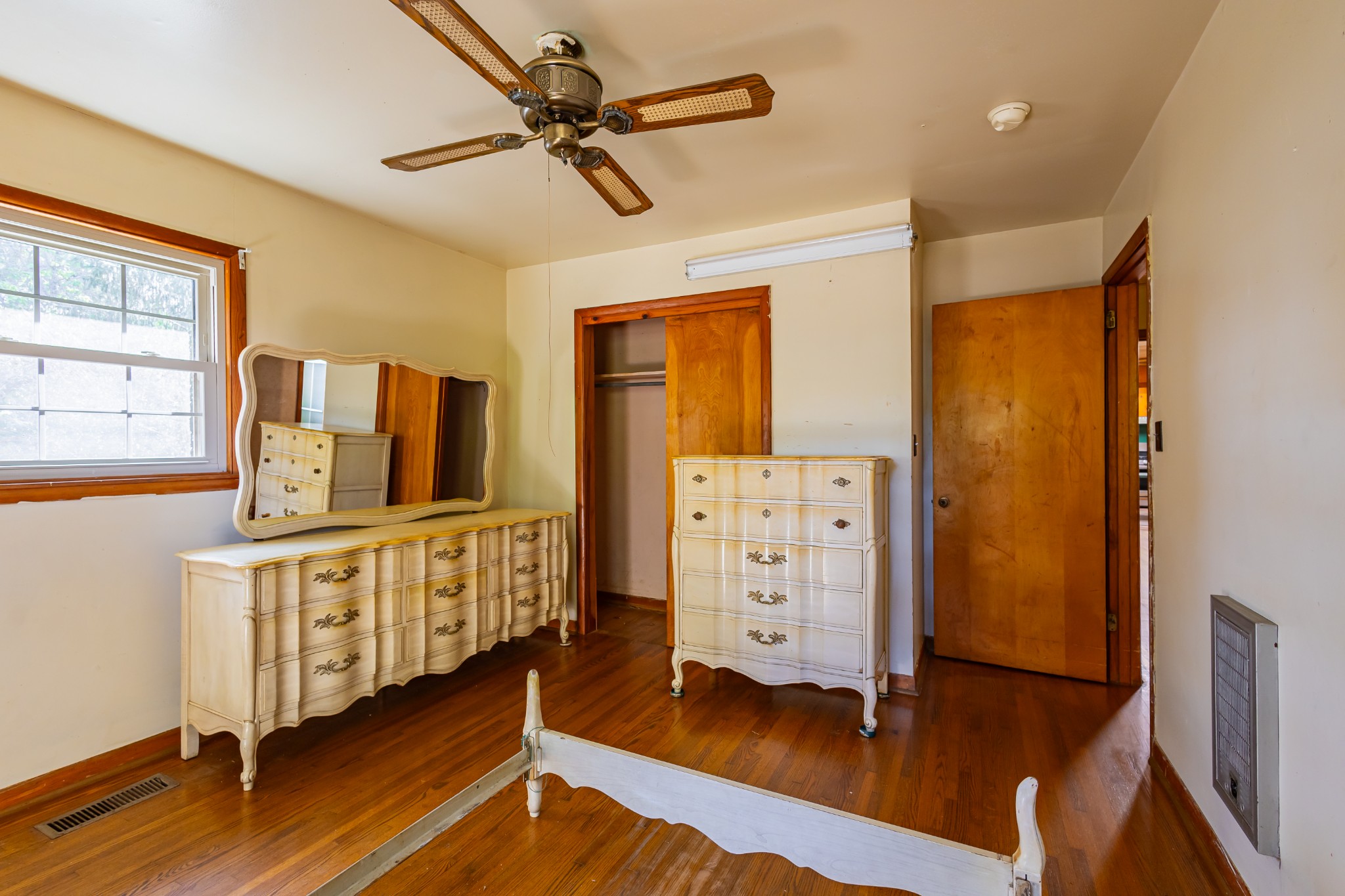 340 Yates Road Hillsboro, TN 37342 - Photo 35 of 69 a kitchen with stainless steel appliances granite countertop a refrigerator a stove a sink and white cabinets with wooden floor
