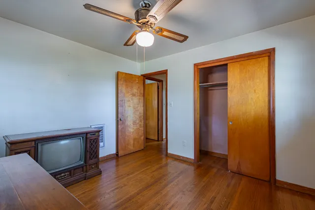 a view of a lake with a building in the background