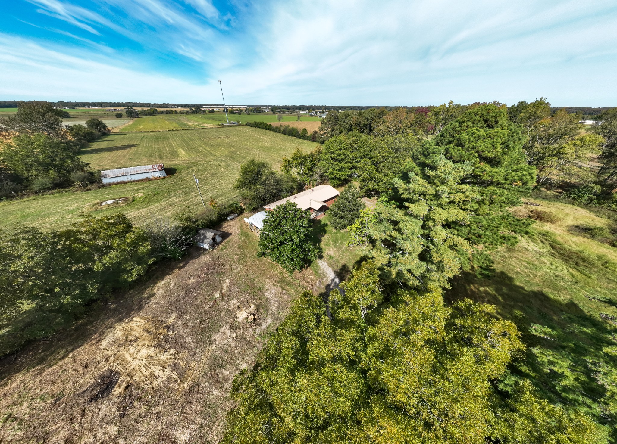 340 Yates Road Hillsboro, TN 37342 - Photo 53 of 69 a view of a lake with a building in the background