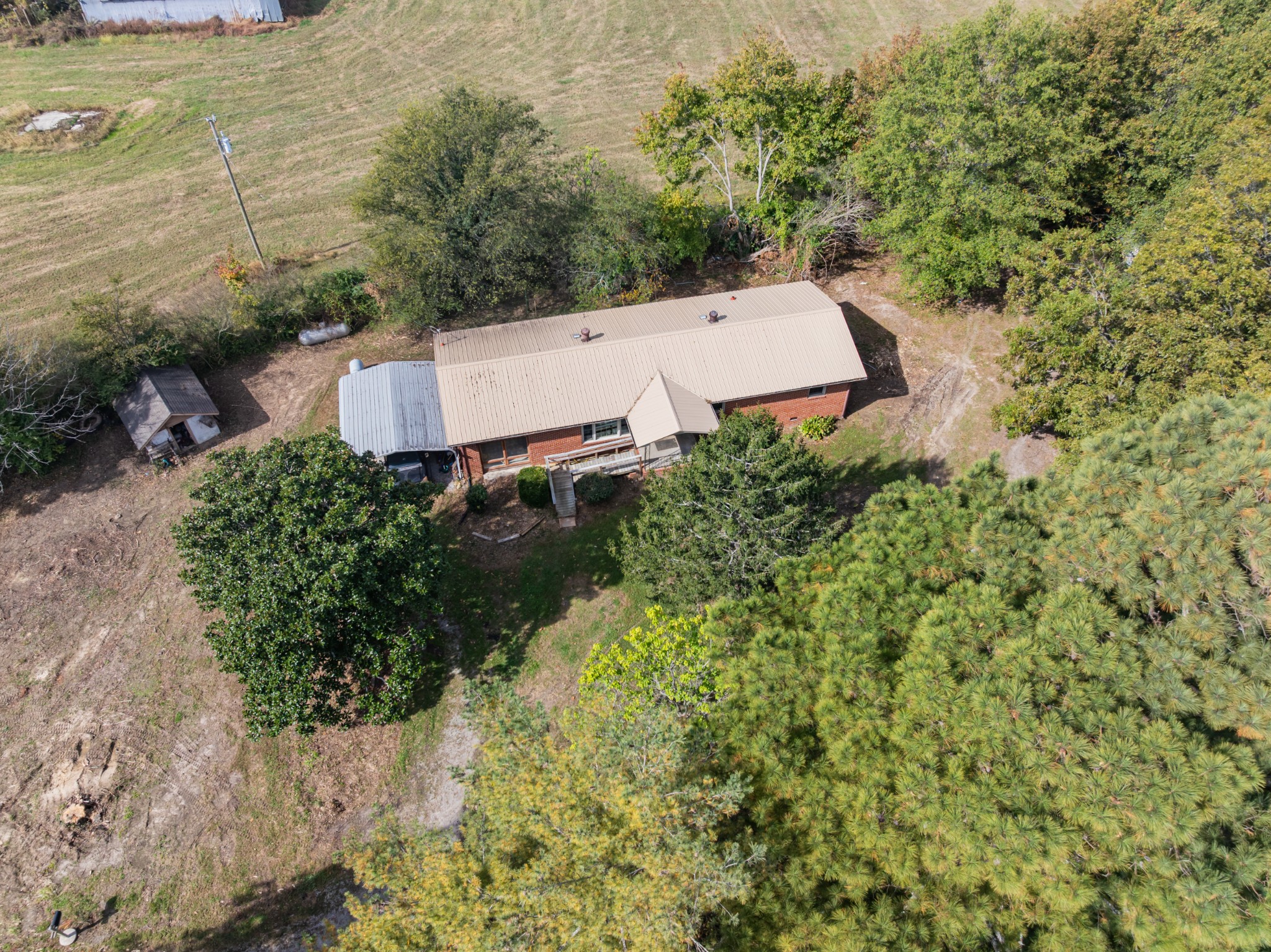340 Yates Road Hillsboro, TN 37342 - Photo 55 of 69 an aerial view of a house with yard and outdoor seating