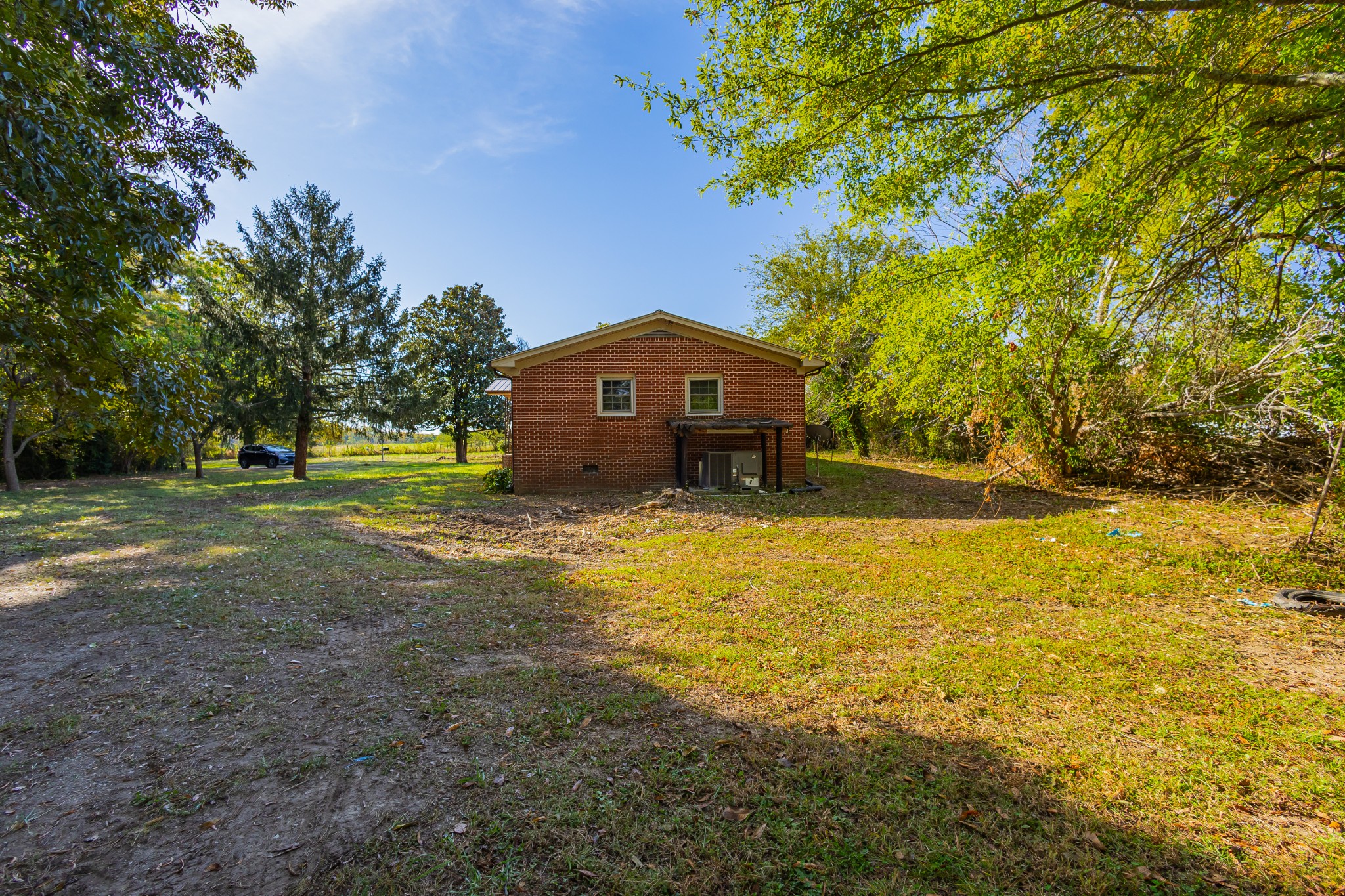 340 Yates Road Hillsboro, TN 37342 - Photo 8 of 69 a front view of a house with a garden