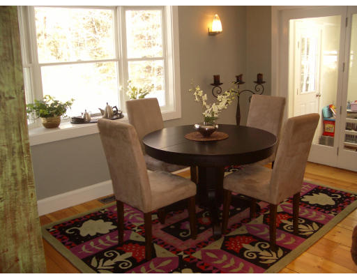 283 Littleton County Road Harvard, MA 01451 - Photo 4 of 22 a dining room with furniture and wooden floor