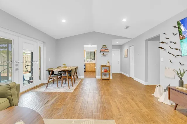 a living room with furniture and a table