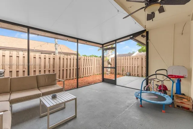 a view of a livingroom with furniture and a couch