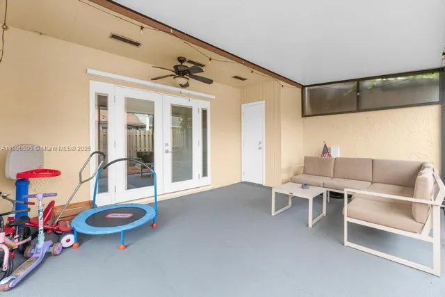 a view of a livingroom with furniture and toys