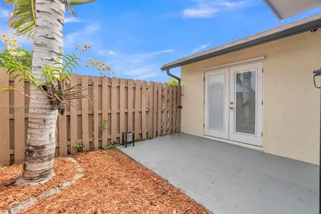 a view of a backyard of a house