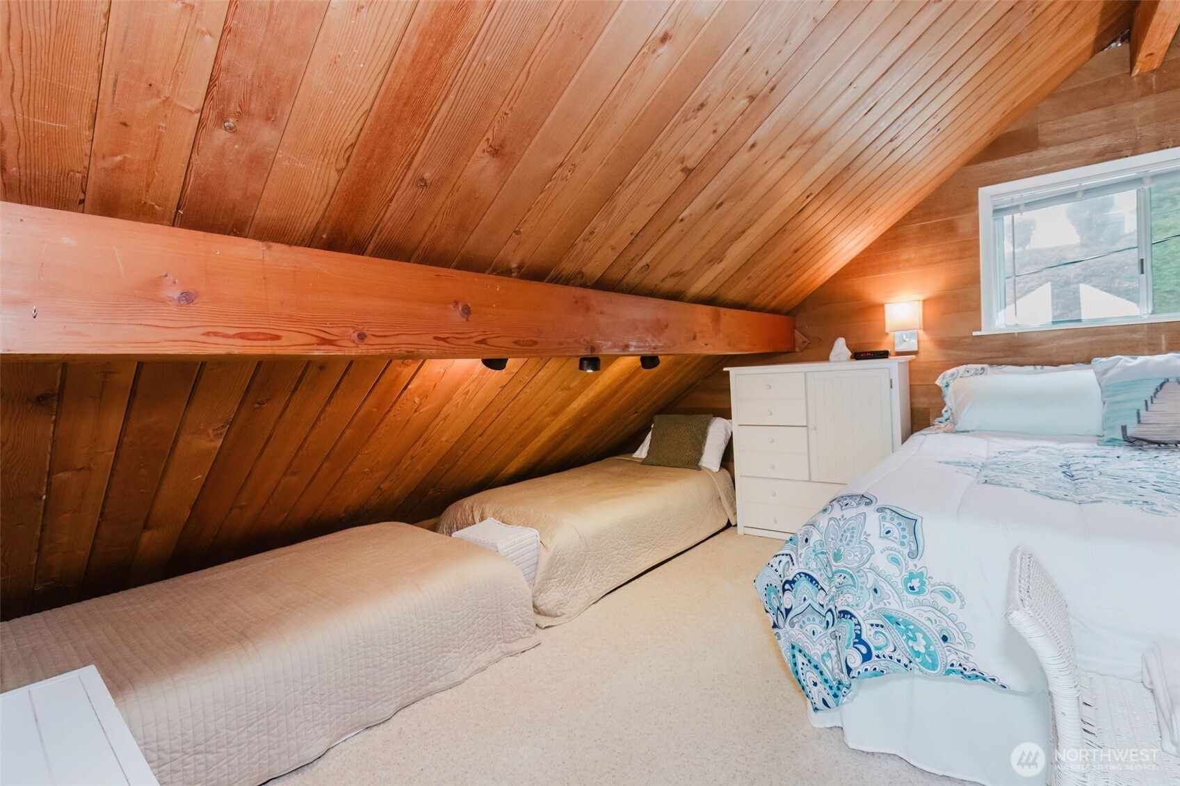 10271 Northeast North Shore Road Belfair, WA 98528 - Photo 28 of 38 a close up of a bed