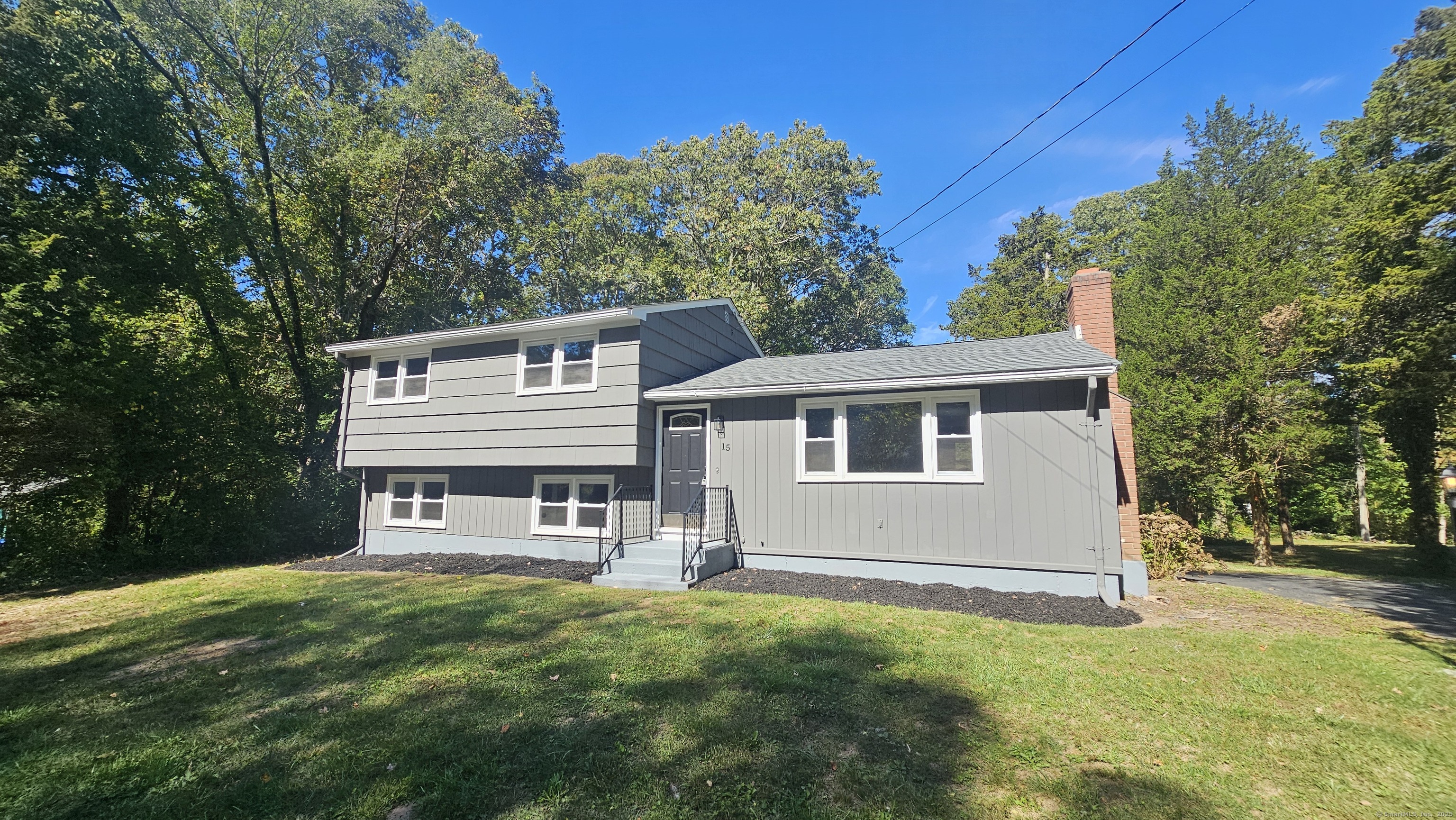 15 Alden Drive Clinton, CT 06413 - Photo 1 of 1 a front view of a house with a yard