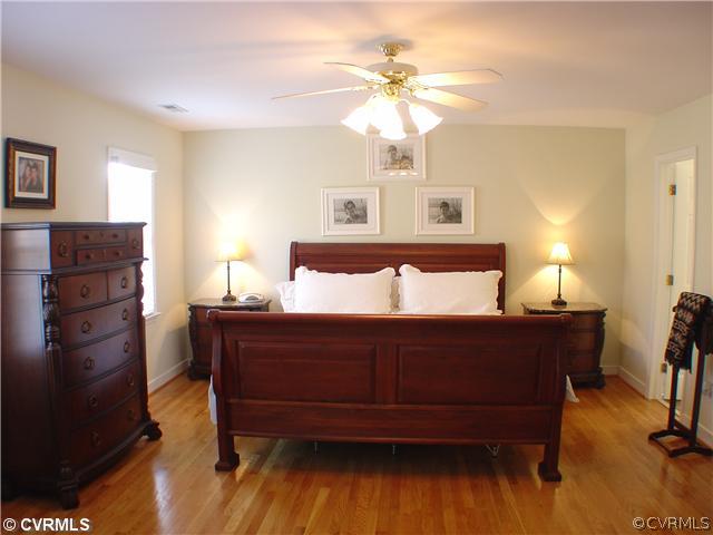 2030 Thornleigh Road Midlothian, VA 23113 - Photo 8 of 12 Master Bedroom - This master suite features hardwo