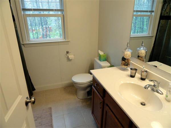52 Sprague Road Clinton, MA 01510 - Photo 12 of 14 a bathroom with a sink toilet and tub