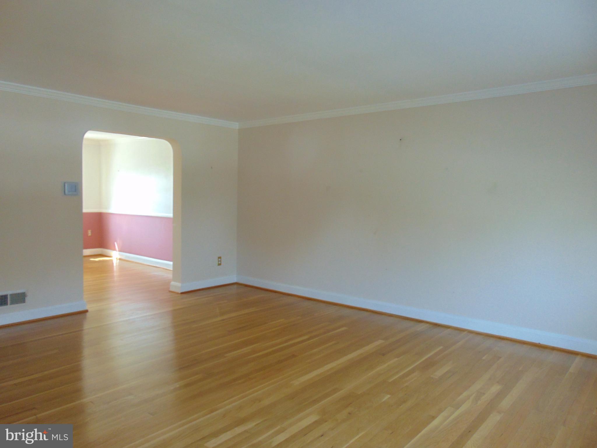 1513 Dellsway Road Baltimore, MD 21286 - Photo 6 of 19 Living Room Adjacent to Formal Dining Room