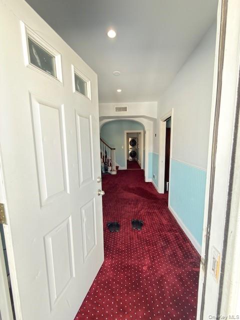 48 Church Street Patchogue, NY 11772 - Photo 16 of 19 a view of entryway with wooden floor