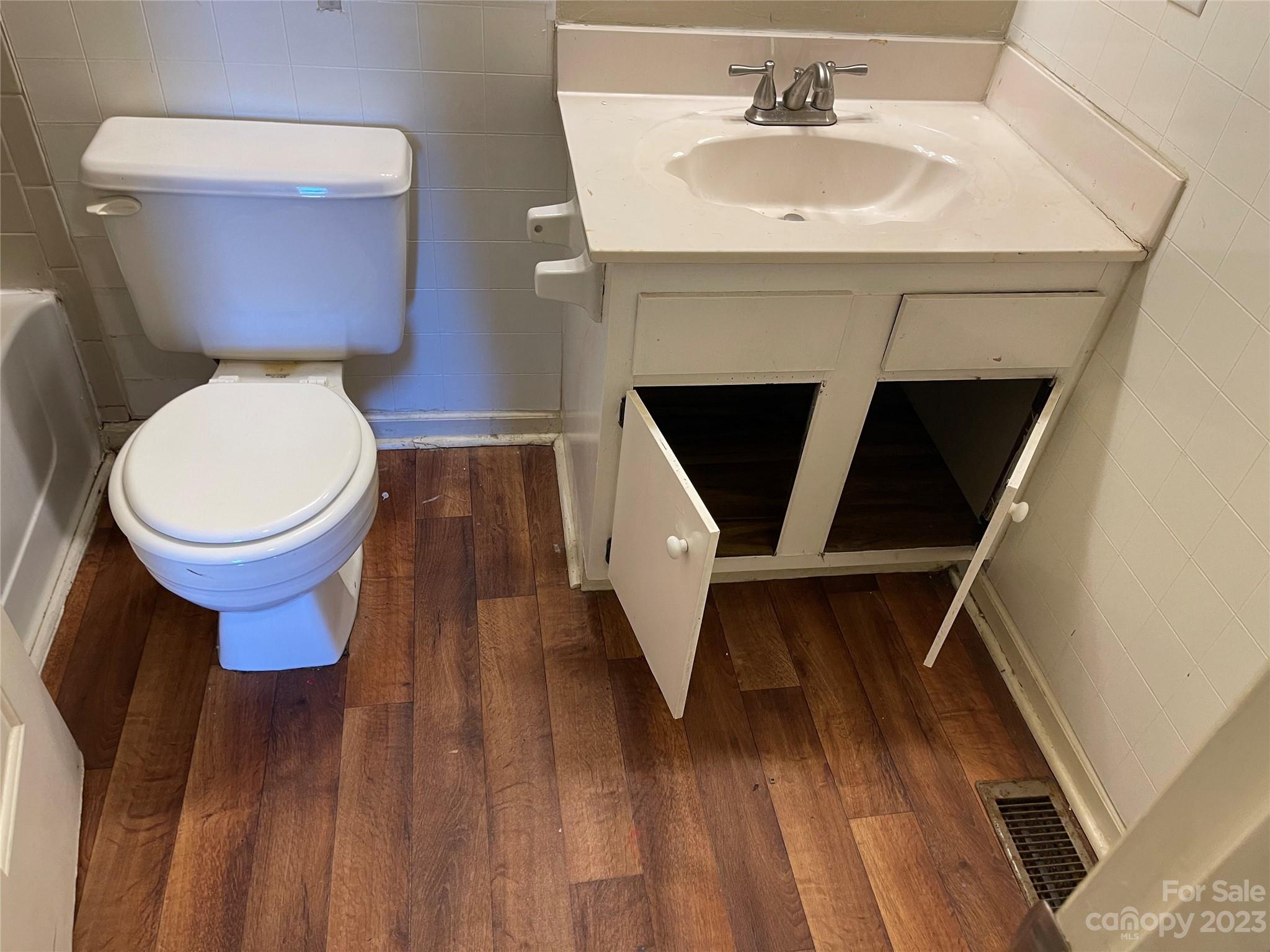 2940 Rural Hill Court Matthews, NC 28105 - Photo 15 of 24 a bathroom with a sink and a toilet