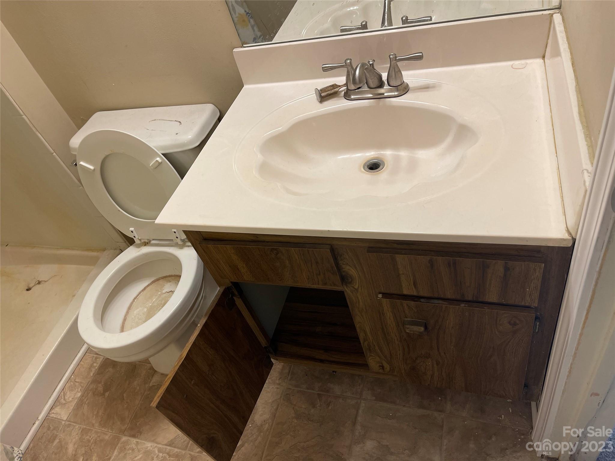 2940 Rural Hill Court Matthews, NC 28105 - Photo 23 of 24 a bathroom with a sink and a mirror