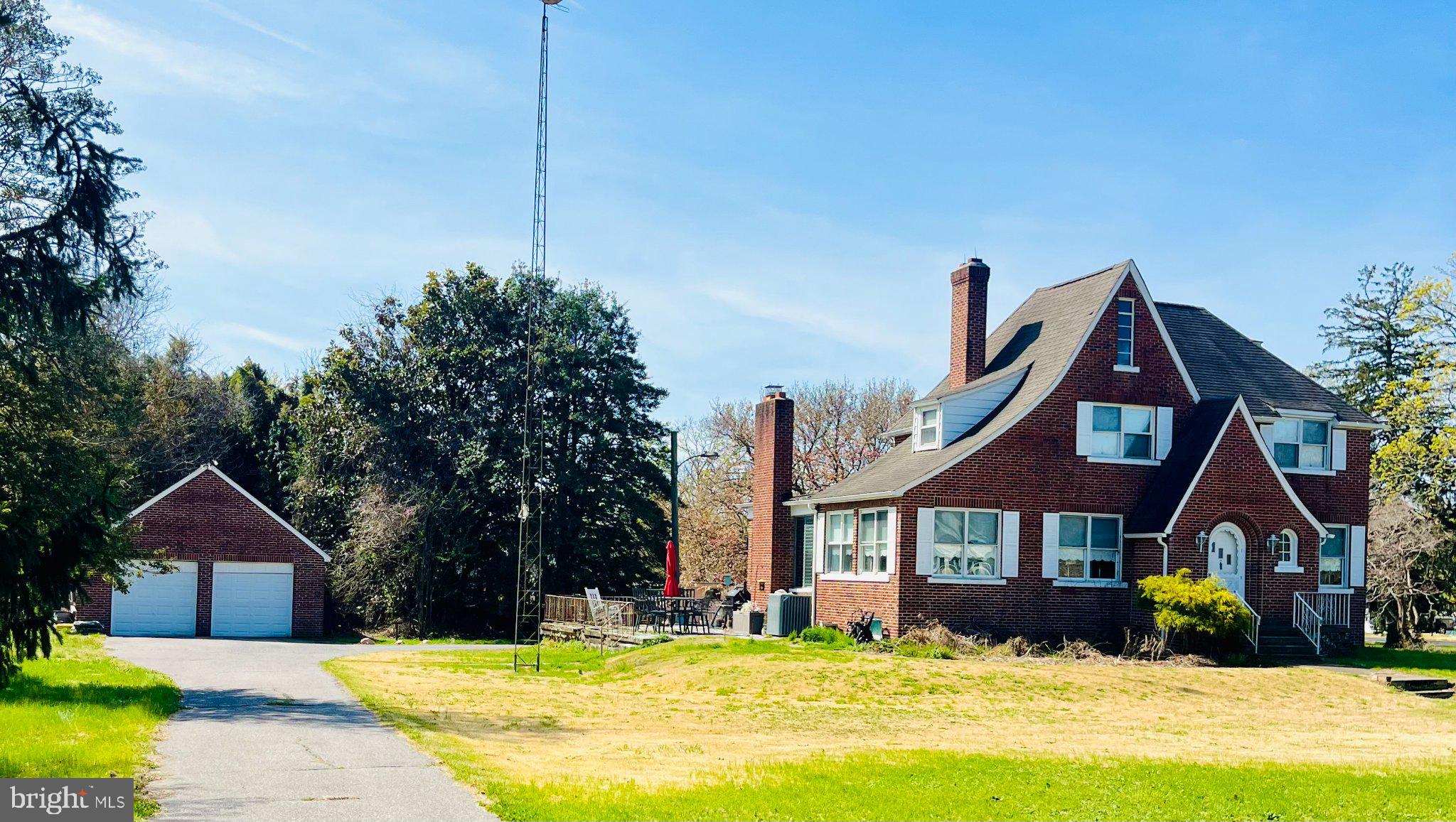 Charming brick Tudor style home w/detached garage