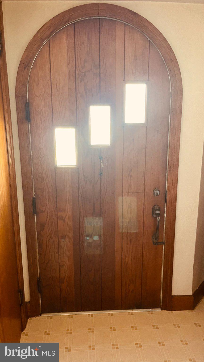 425 Big Oak Road Bridgeton, NJ 08302 - Photo 14 of 15 Charming arched wooden entryway.
