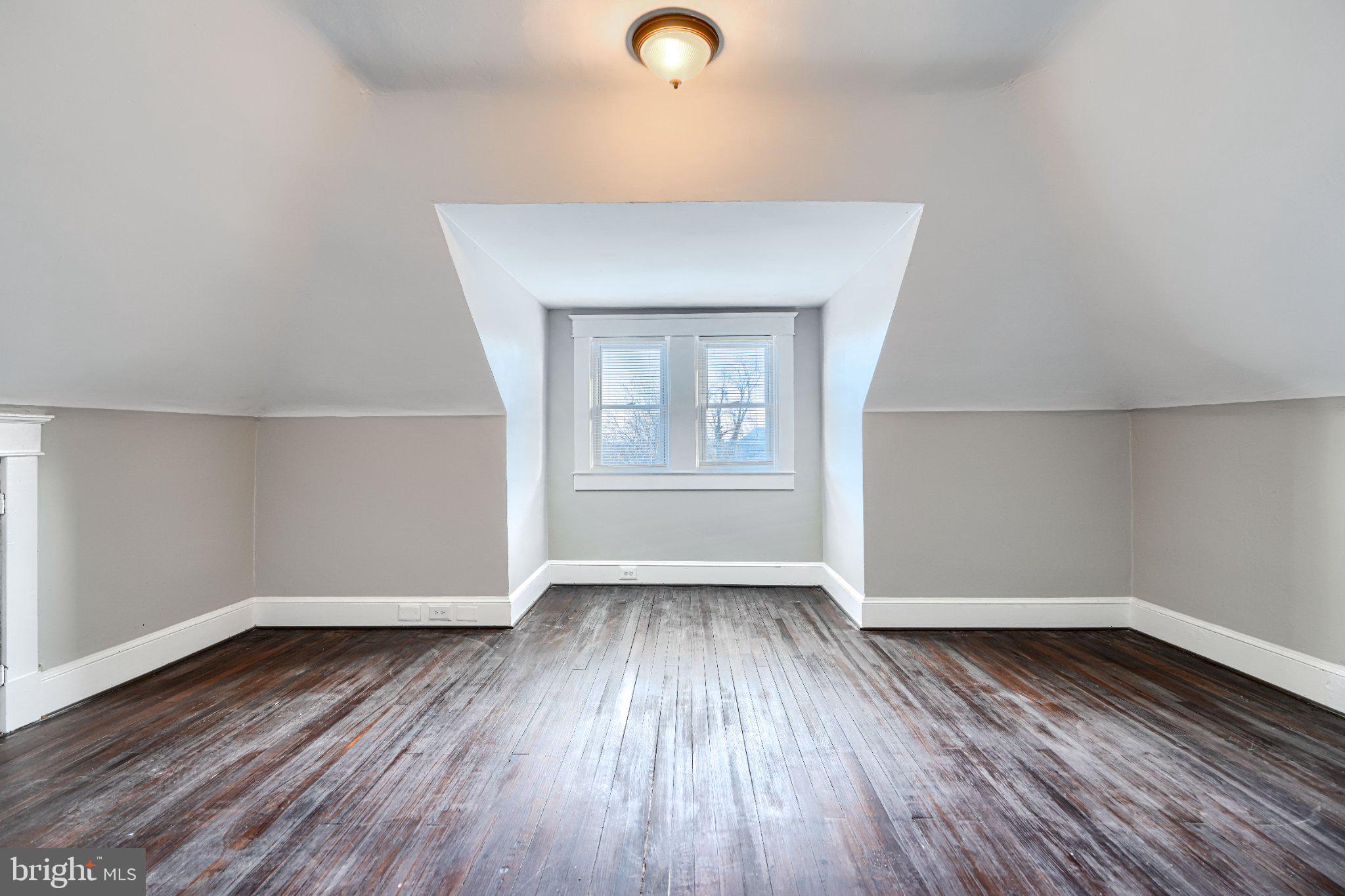 3414 Alto Road, Unit 2 Baltimore, MD 21216 - Photo 14 of 25 Spacious attic with charming light.