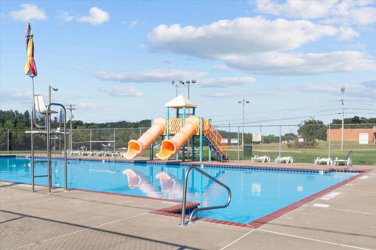 0 Rustling Oaks Drive Waverly, TN 37185 - Photo 21 of 28 a view of a swimming pool with a lounge chairs