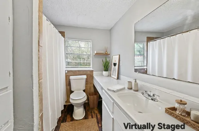a bathroom with a sink and a toilet