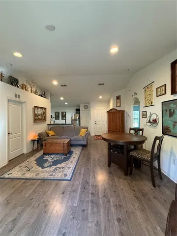 a view of a garage with parked cars