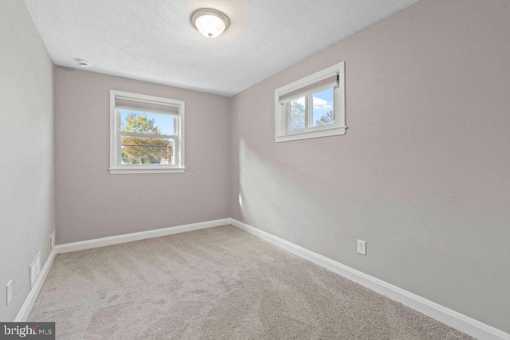 6307 Fairdel Avenue Baltimore, MD 21206 - Photo 20 of 36 an empty room with windows