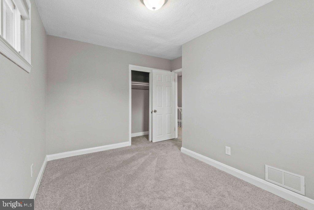 6307 Fairdel Avenue Baltimore, MD 21206 - Photo 21 of 36 a view of an empty room and window