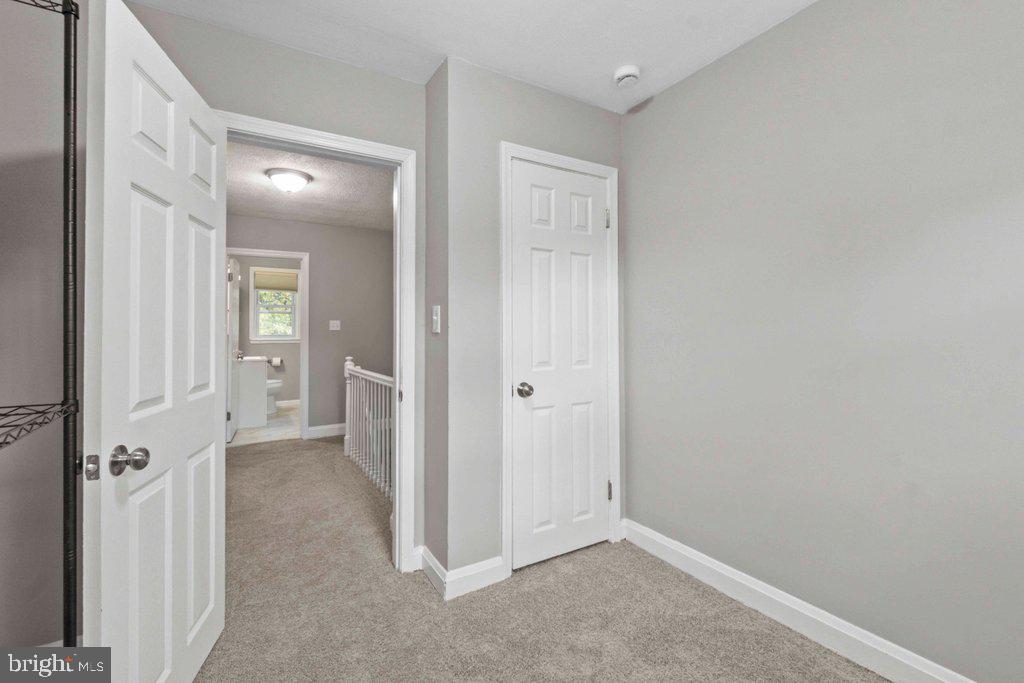 6307 Fairdel Avenue Baltimore, MD 21206 - Photo 23 of 36 wooden floor with a bathroom