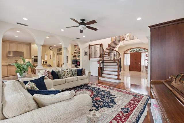 a living room with furniture and a rug