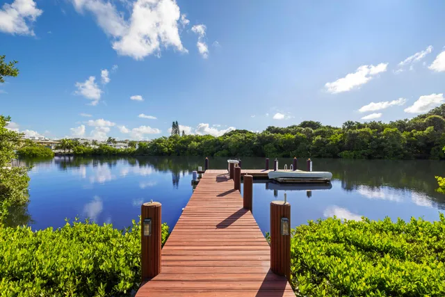 a wooden floor and lake view