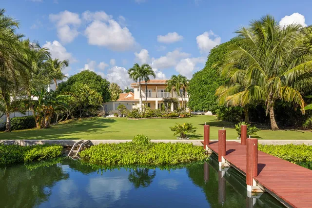 a view of a garden with houses