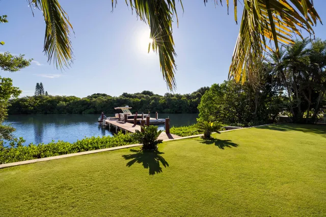 a view of a lake with a yard
