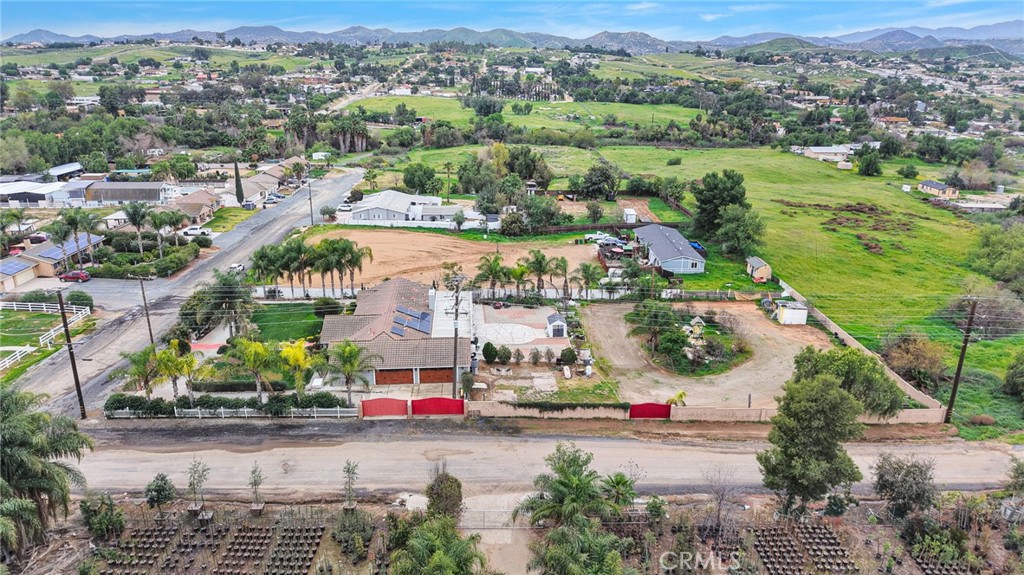 17777 Brazier Drive Riverside, CA 92508 - Photo 54 of 55 an aerial view of residential houses with outdoor space and parking